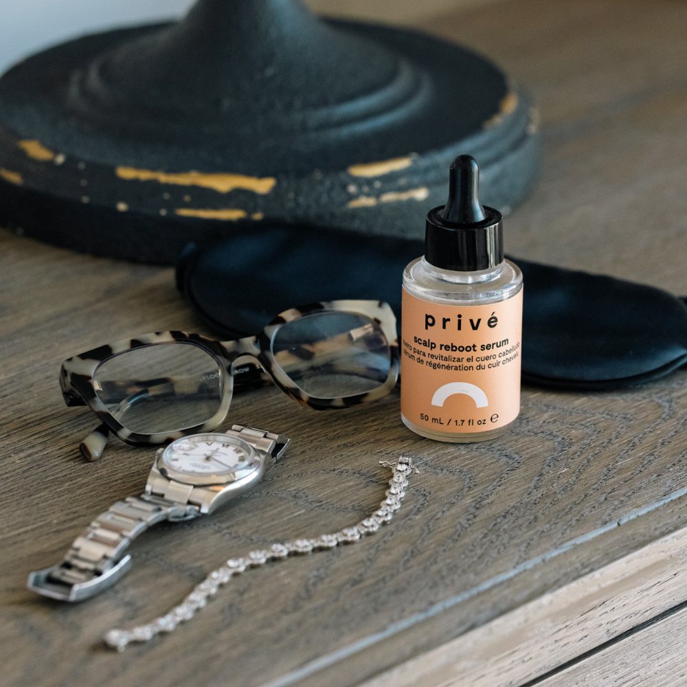 prive scalp reboot serum - product on nightstand