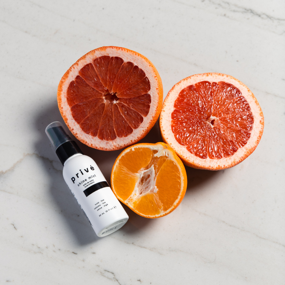 privé shine mist - product with fruit