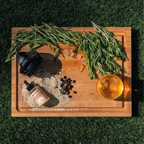 prive scalp reboot serum - product on wood