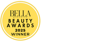 A yellow circular badge with black text reading 'BELLA MAGAZINE BEAUTY AWARDS 2025 WINNER' on a white background.