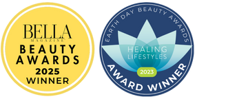 Two award badges on a white background: a yellow circular BELLA MAGAZINE BEAUTY AWARDS 2025 WINNER badge on the left, and a blue circular EARTH DAY BEAUTY AWARDS HEALING LIFESTYLES AWARD WINNER 2023 badge on the right.